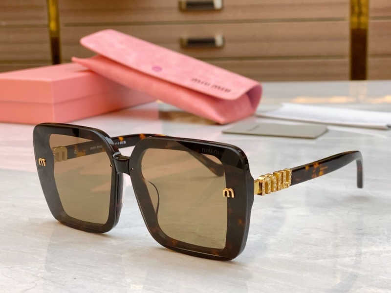 Miu miu Sunglasses